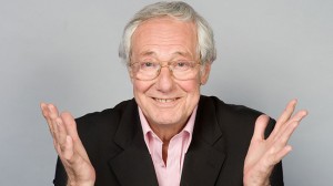 Photo of Barry Norman with hands outstretched